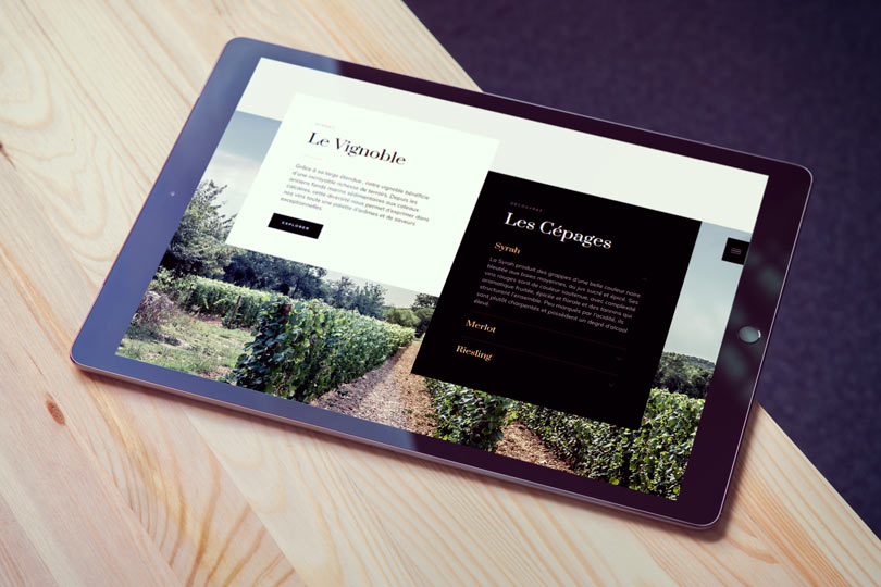 Présentation d'une page du site web domaine viticole Winery sur une tablette.